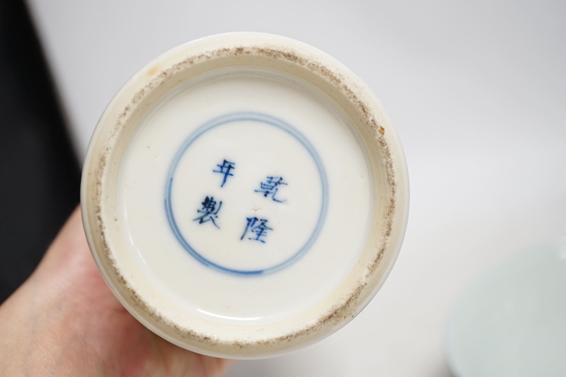 A Chinese famille verte ‘scholars’ vase and a Chinese powder blue bowl, both 19th century, vase, 32cm high